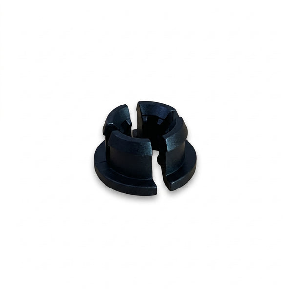 A small 3D printed black bushing component with a split center, shown on a plain white background.
