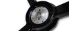 A black three-spoke steering wheel shown on a white background, with mounting hardware and a center cap placed below it.