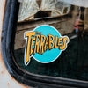 Sticker with 'The Terrables' logo on a vehicle window